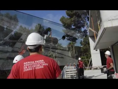 House Schäfer. how to install a large glass window of 900 kg?