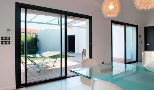 INCONEX- Ventanas de aluminio y PVC kommerling , Puertas Seccionales y Automatismos